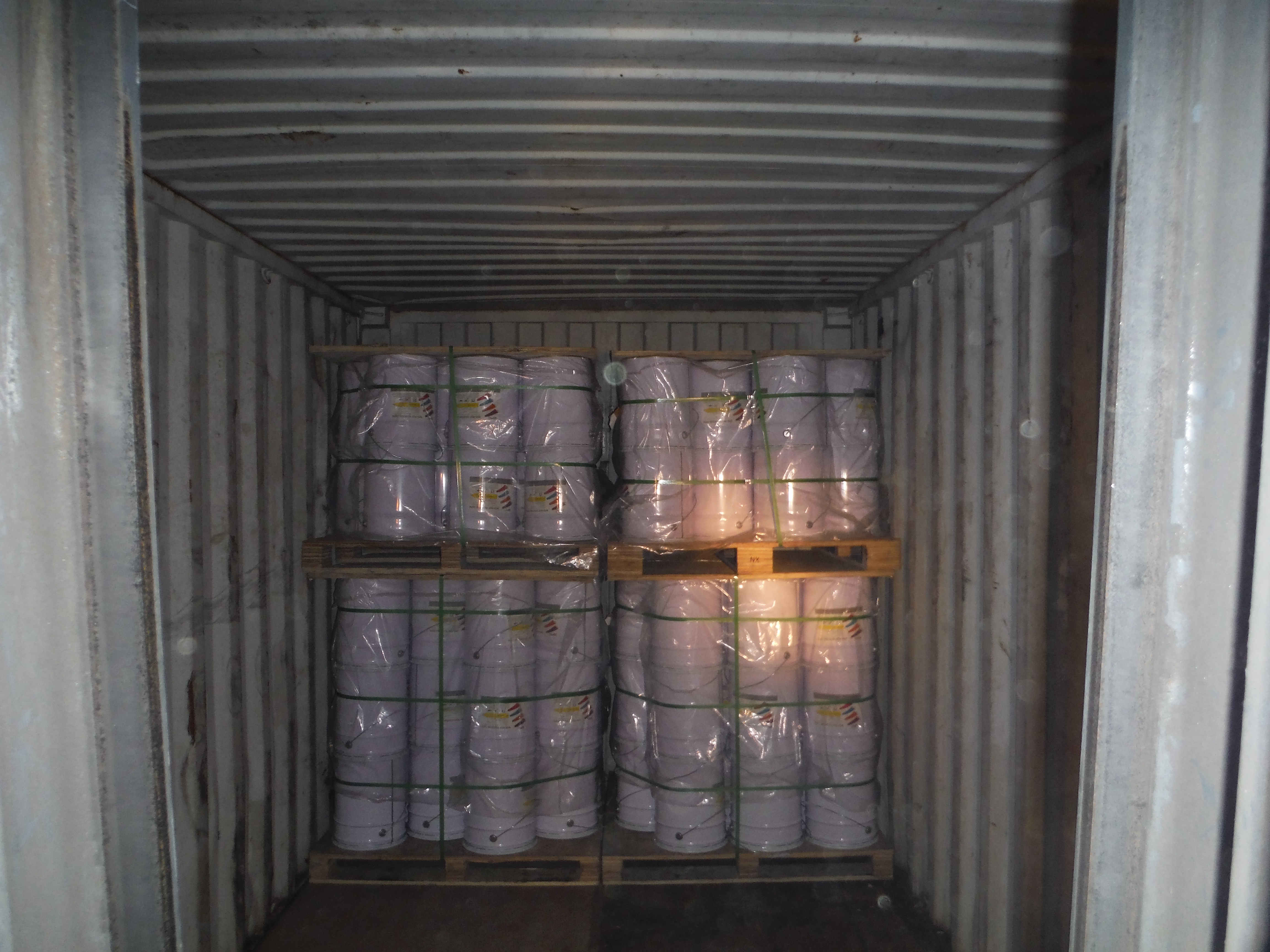 Pails of one component polyurethane waterproofing and spray system loaded in container for Paraguay